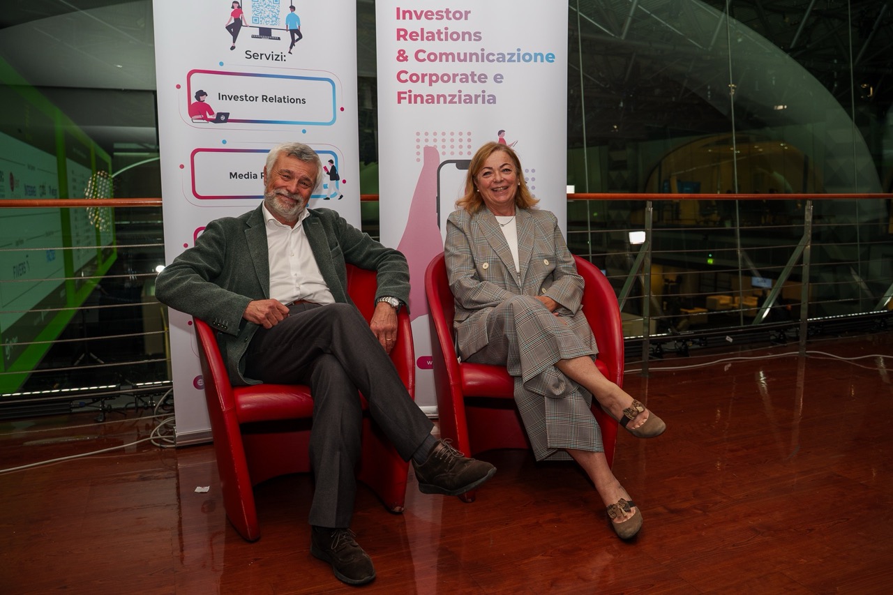 Mara Di Giorgio and Marco Messori, founders of My Twin Communication sitting together.